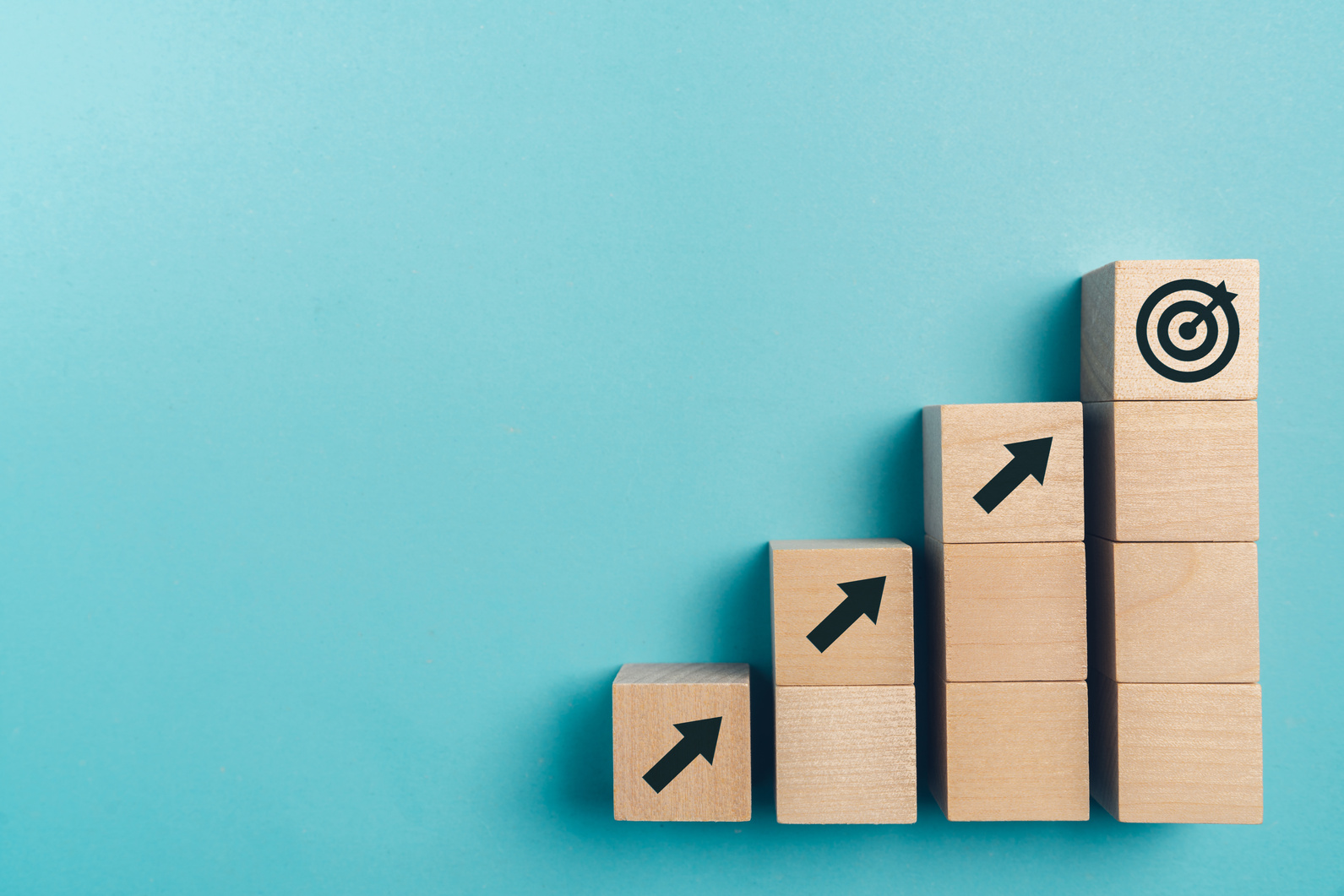 Business growth concept , wood block stacking as step stair on paper blue background, copy space.